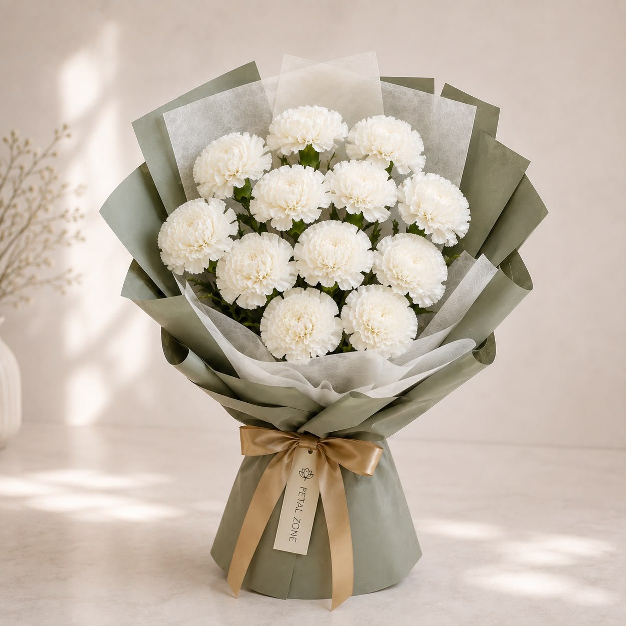 A Dozen Petals of Peace – 12 White Carnations Flat Bouquet